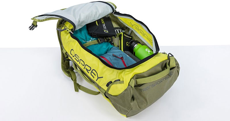 Yellow osprey backpack filled with camping items