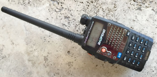 Baofeng UV-5R from the front on the ground