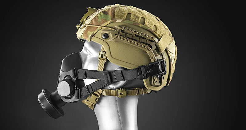 The Mira Safety Tactical Air-Purifying Respirator Mask (TAPR) shown with a tactical helmet and helmet mounting system