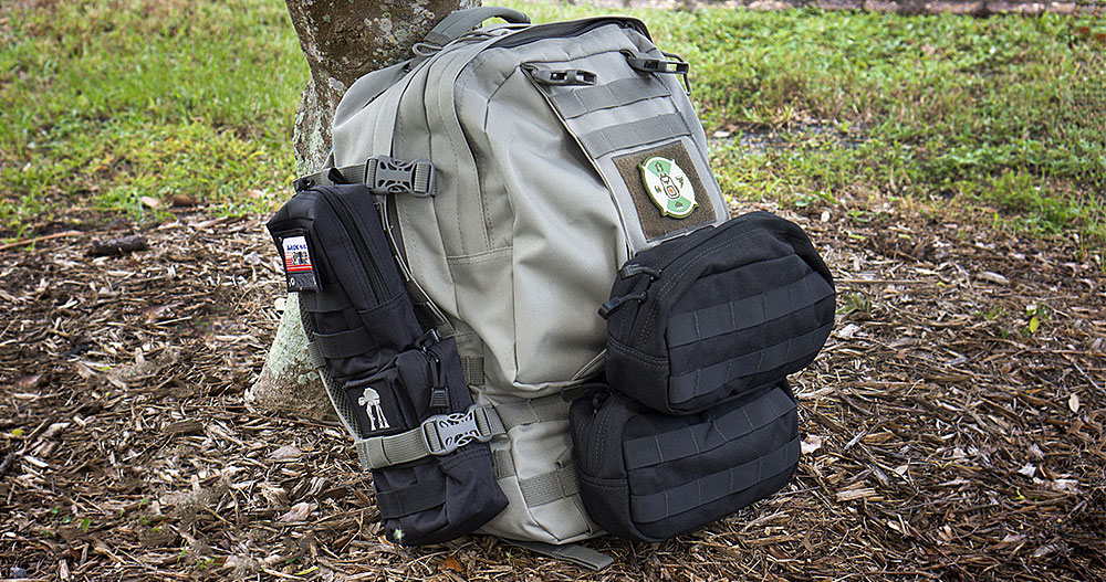 Paratus 3-Day Operators Pack Against A Tree with accessory pouches