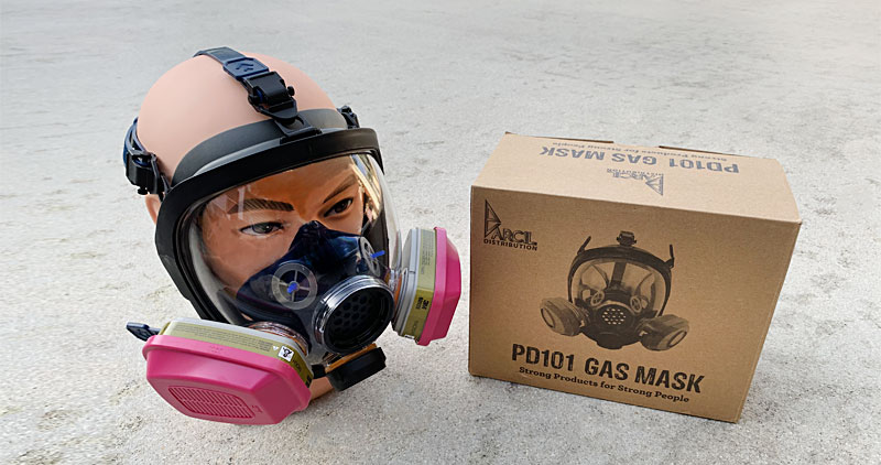 Parcil Safety PD-101 shown with 3M 60926 filters on a mannequin head on the ground