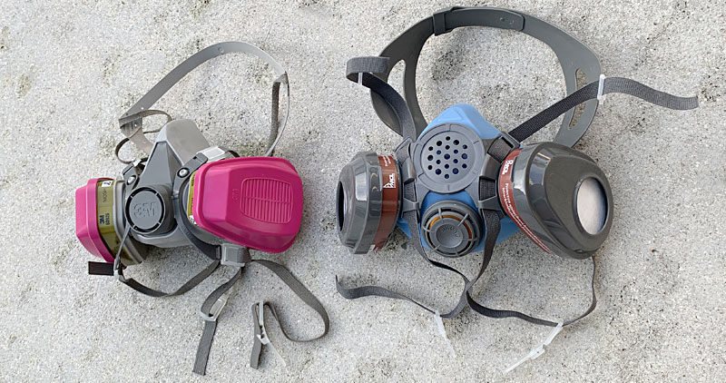 3M 6000 series half face mask next to a Parcil Safety P60 mask