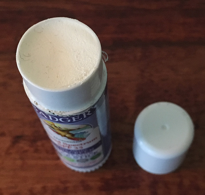 Badger SPF 35 Sunscreen Face Stick open top to show cream