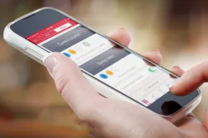 Cell phone in someones hand with an app on it