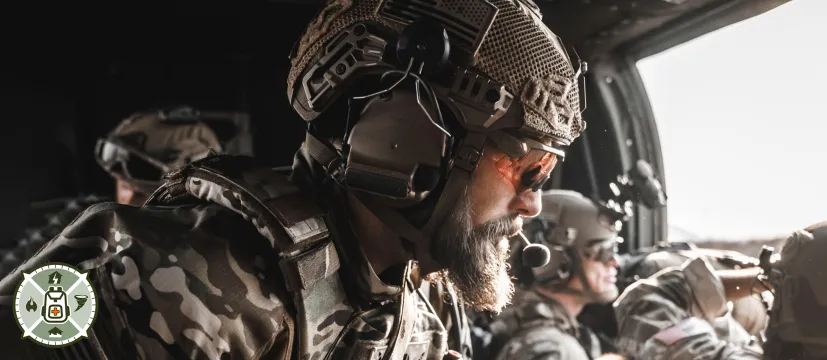 Man in a helicopter wearing a helmet