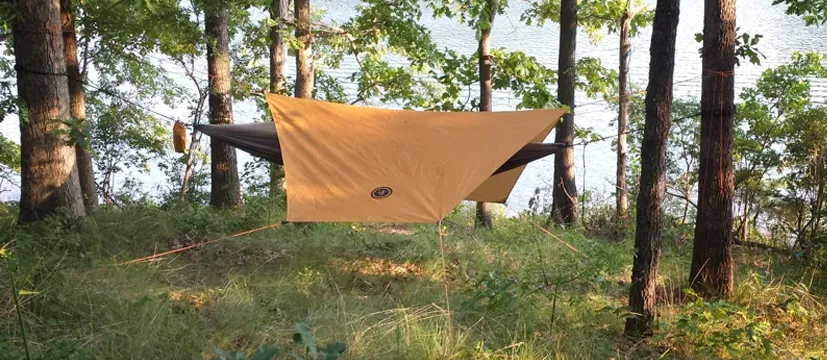 UST Tarp & GT Skeeter Beeter Hammock in the woods in front of a lake