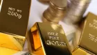 Bars of gold and gold coins
